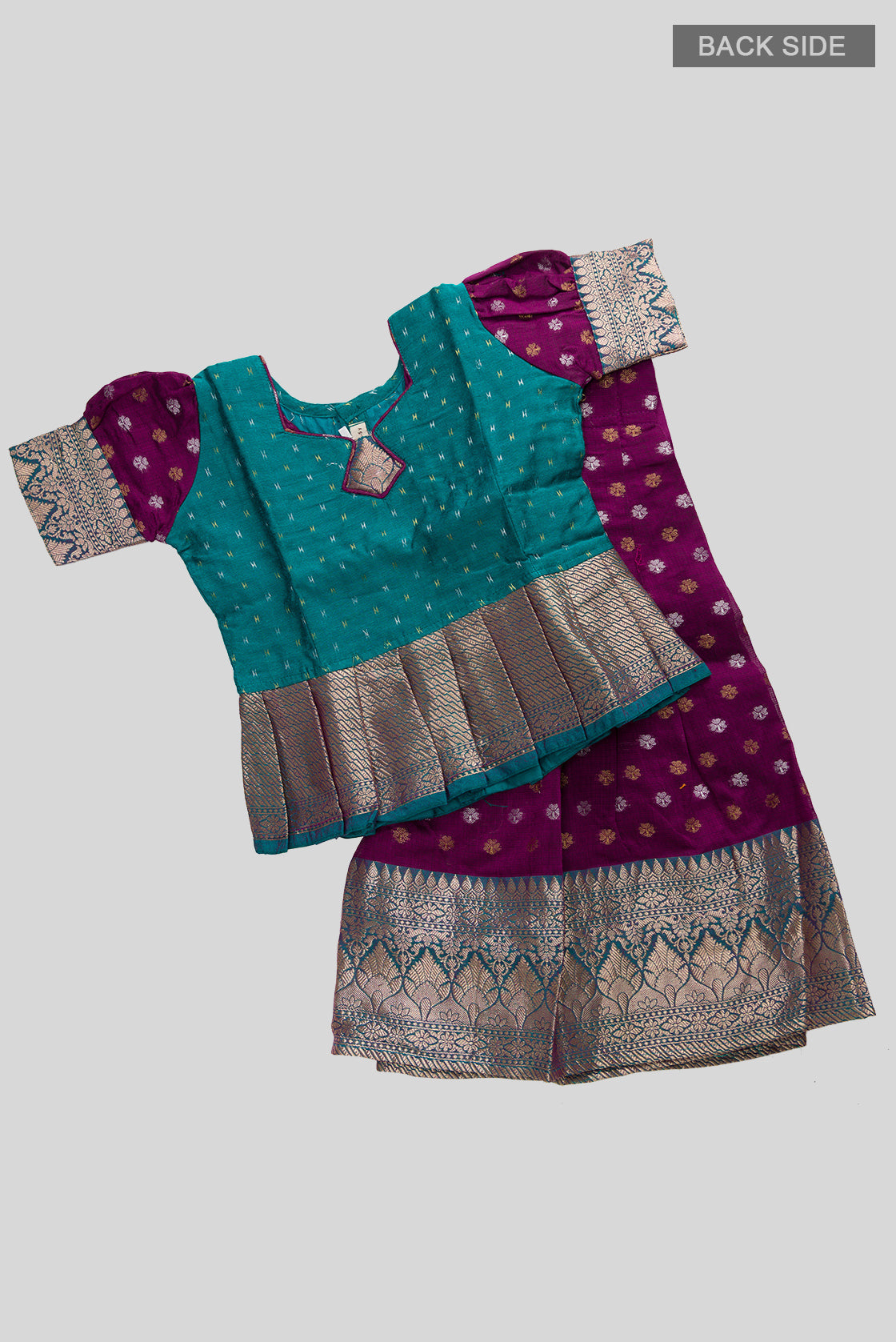 Flat lay back image of Green Readymade Cotton Pavadai Set with Zari Butta on the body and Zari Border
