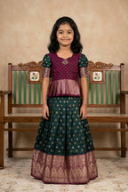 Magenta Readymade Cotton Pavadai Set with Zari Butta on the body and Zari Border displayed on a mannequin