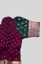 Close up sleeve details of Magenta Readymade Cotton Pavadai Set with Zari Butta on the body and Zari Border