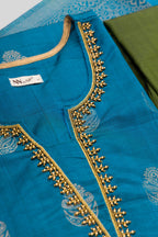 Detailed shot of Peacock Blue Pure Silk Womens Kurta set featuring Zari Butta Kurta paired with Green Plain Body bottom and a Zari Butta dupatta in Green