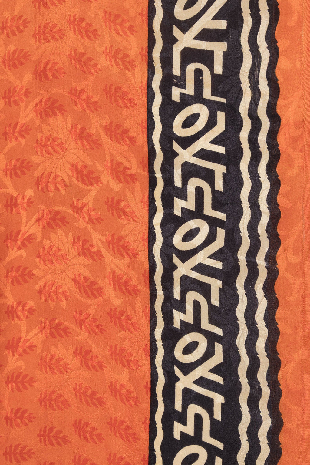 Border image of Orange Dual Tone Mysore Crepe Saree with Printed design on the body and Printed Border. 
