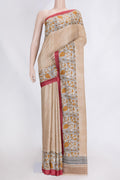 Beige Dual Tone Tussar Saree with Plain Body and Printed Border.  displayed on a mannequin