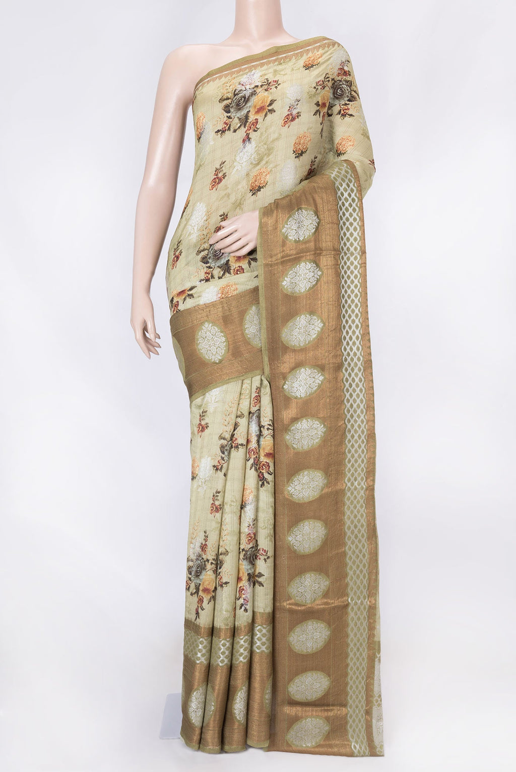 Light Green Dual Tone Tussar Silk Saree with Printed design on the body and Zari Border displayed on a mannequin