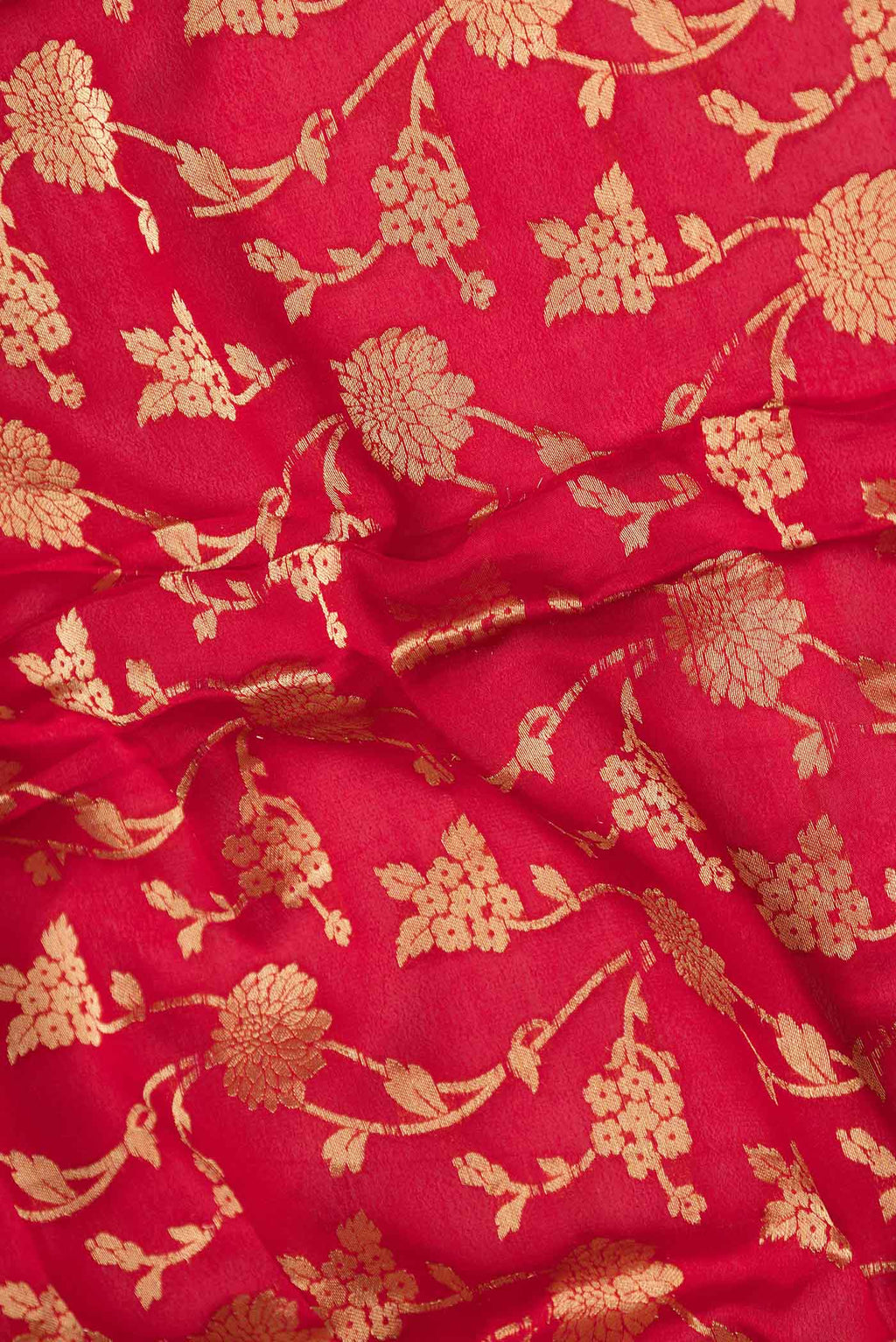 Close up of Red Mysore Crepe Saree with Zari Brocade on the body and Zari Border displaying folds