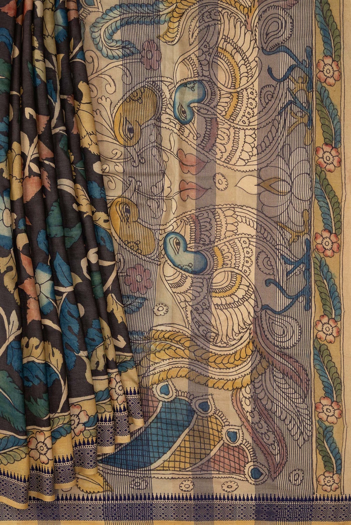 Pleats and pallu of Brown Dual Tone Tussar Silk Saree with Printed design on the body and Printed Border. 