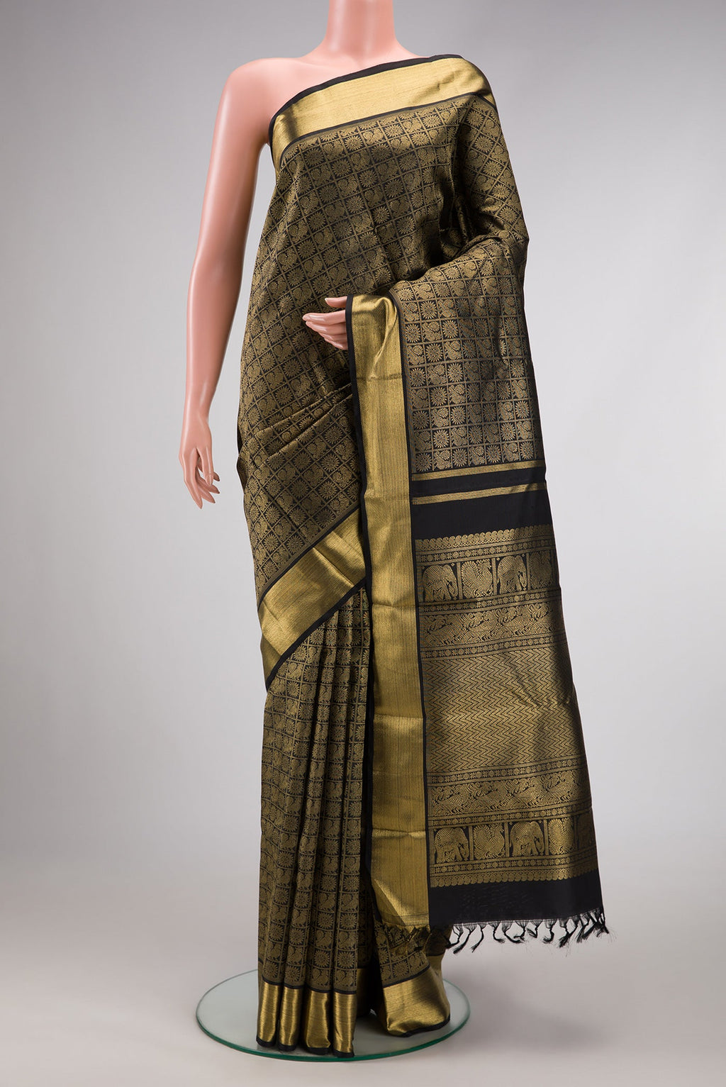 Pure Silk Pure Zari Black Dual Tone Kanjivaram Saree with Zari Brocade on the body and Zari Border.  displayed on a mannequin