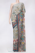 Grey Dual Tone Tussar Silk Saree with Printed design on the body and Embroidery Border.  displayed on a mannequin