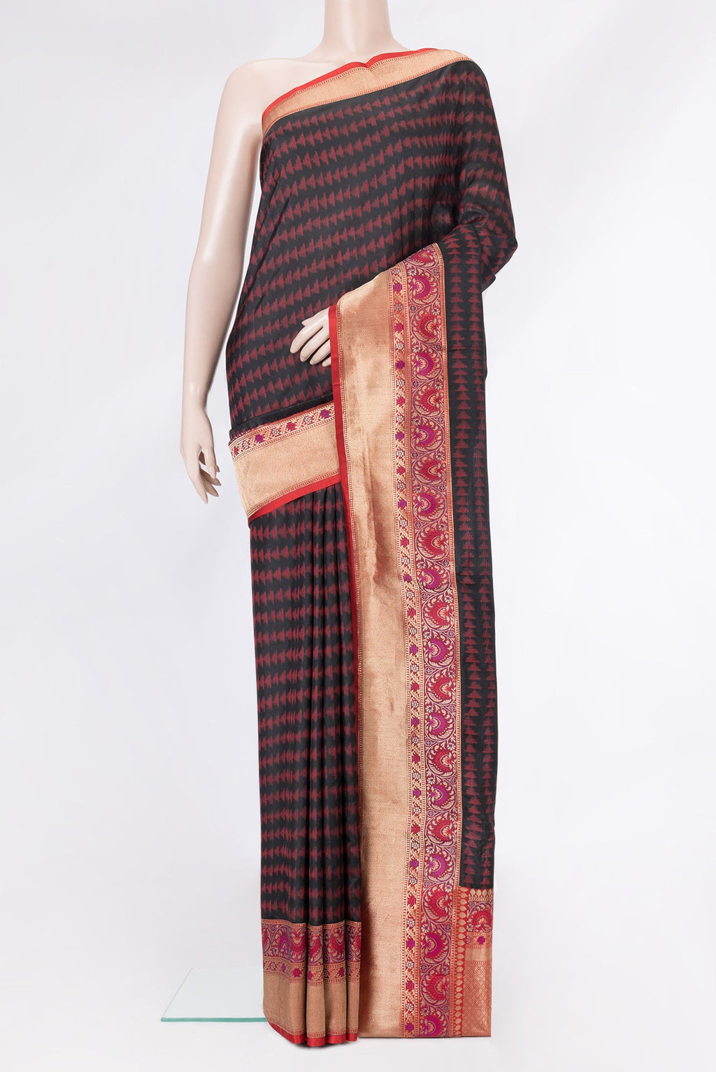 Black Dual Tone Double Ikat Saree with Ikat Print on the body and Fancy Border.  displayed on a mannequin