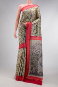 Dark Beige Dual Tone Printed Silk Saree with Printed design on the body and Thread Border.  displayed on a mannequin