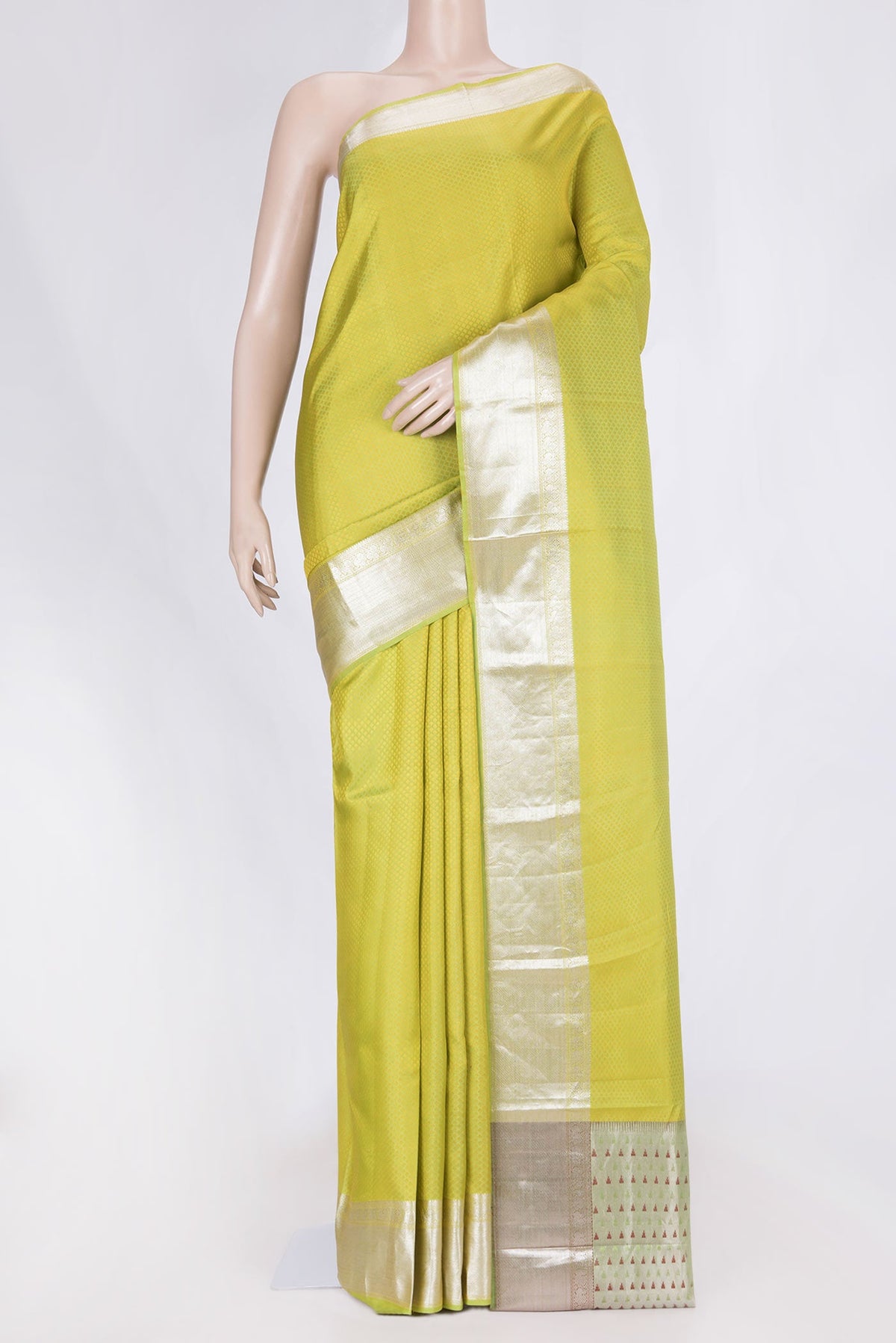 Parrot Green Dual Tone Kanchipuram Saree with Jacquard design on the body and Zari Border displayed on a mannequin