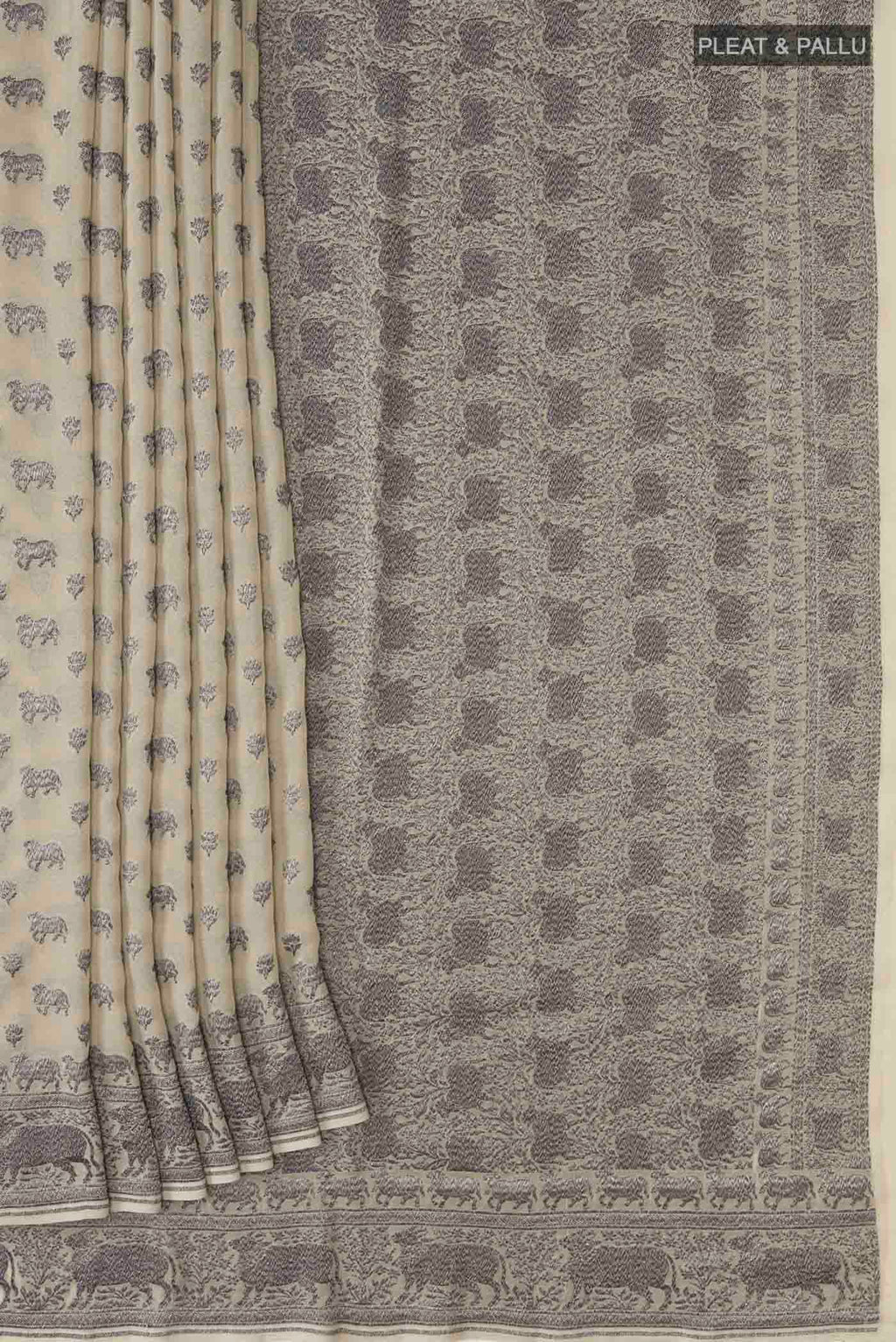Pleats and pallu of Beige Banarasi Georgette Saree with Zari Butta on the body and Zari Border