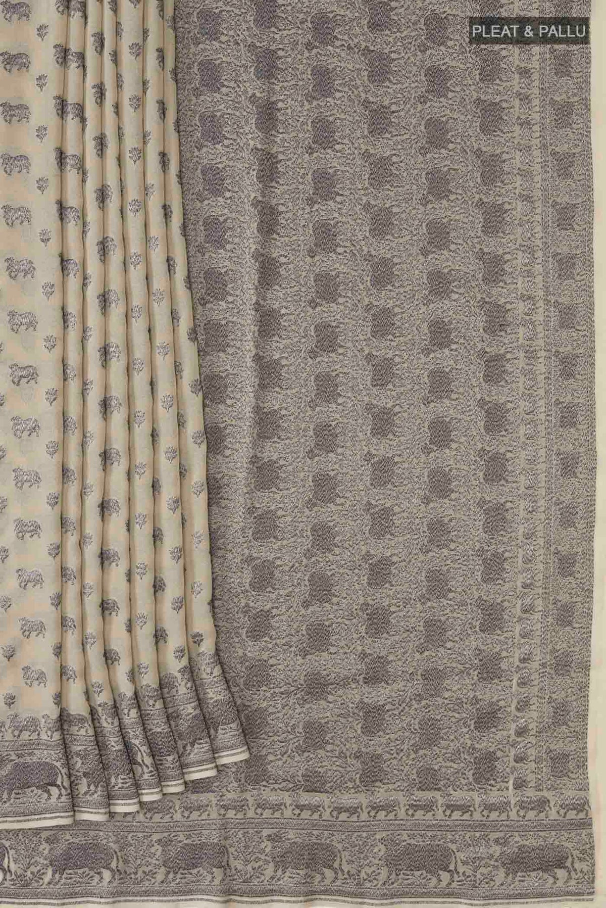 Pleats and pallu of Beige Banarasi Georgette Saree with Zari Butta on the body and Zari Border