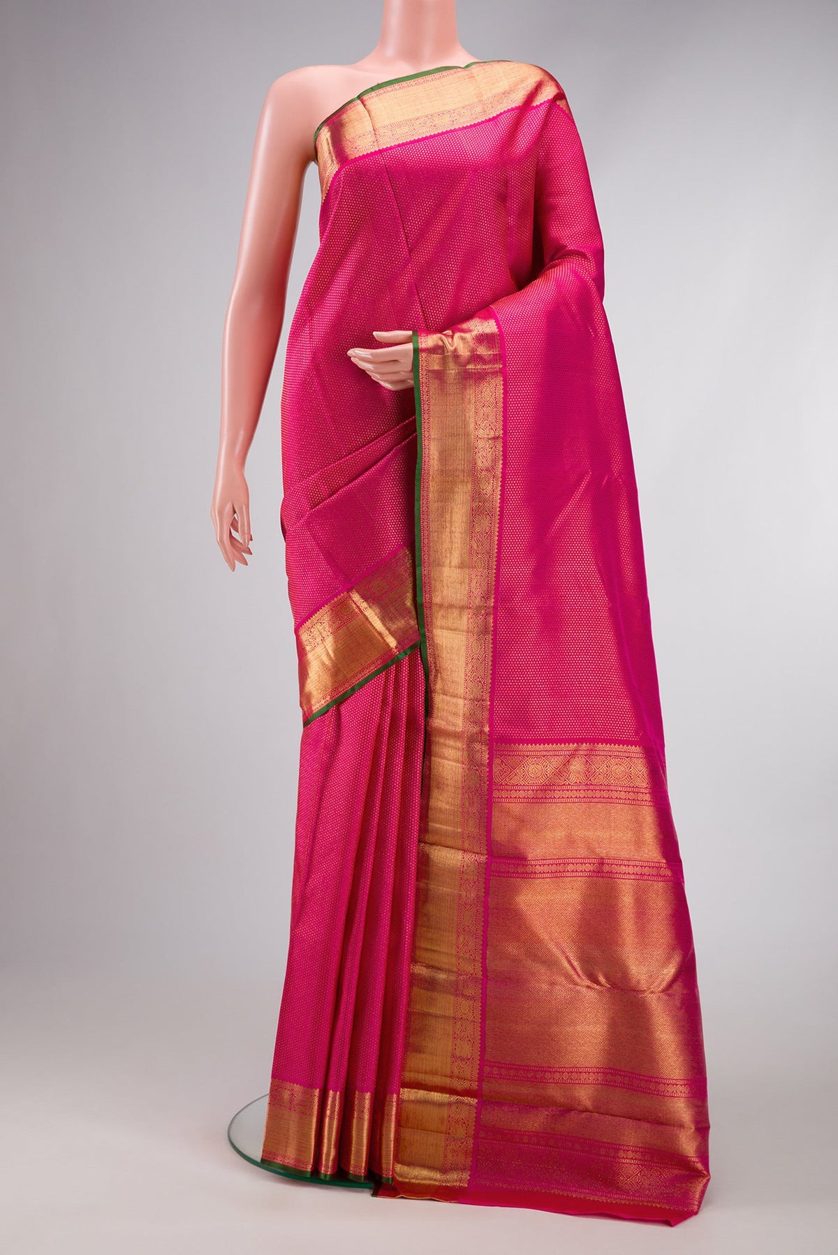 Pure Silk Pure Zari Pink Dual Tone Kanjivaram Saree with Zari Brocade on the body and Zari Border.  displayed on a mannequin
