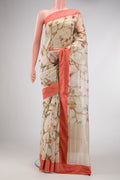 Beige Dual Tone Organza Silk Saree with Printed design on the body and Fancy Border.  displayed on a mannequin