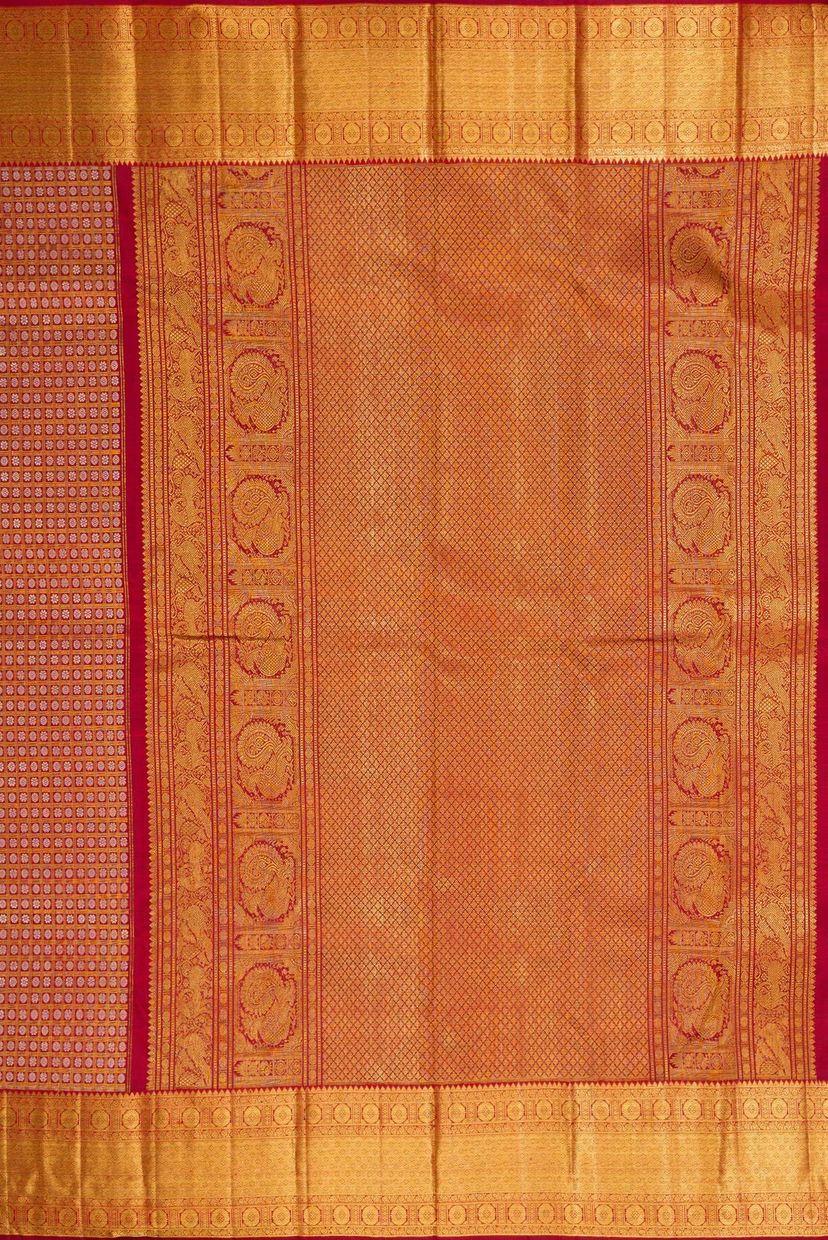 Close up image of the pallu of Maroon Kanchipuram Silk Saree with Zari Brocade on the body and Zari Border. 