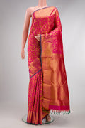 Pink Dual Tone Kanjivaram Silk Saree with Zari Brocade on the body and Zari Border.  displayed on a mannequin