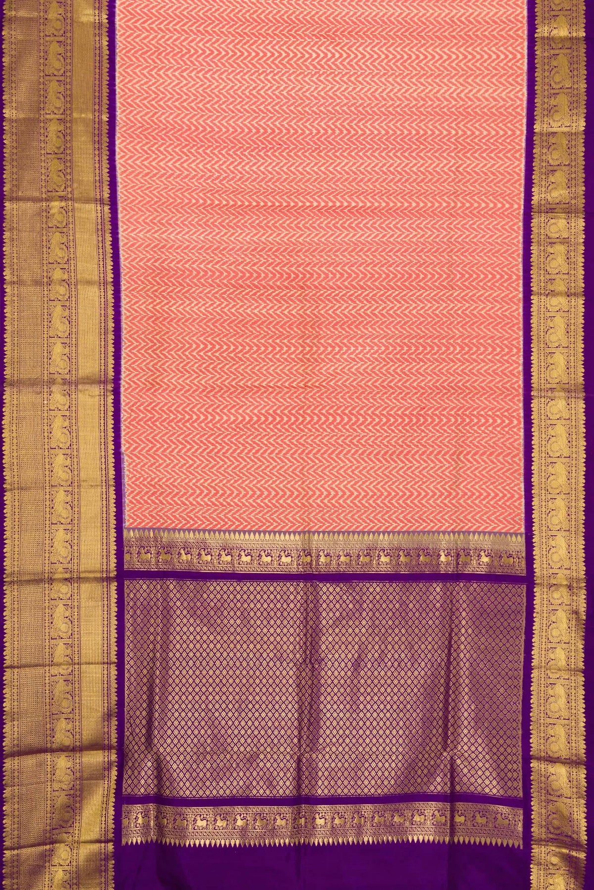 Flat view of Off White and Orange Color Double Ikat Saree with Ikat Print on the body and Zari Border. 