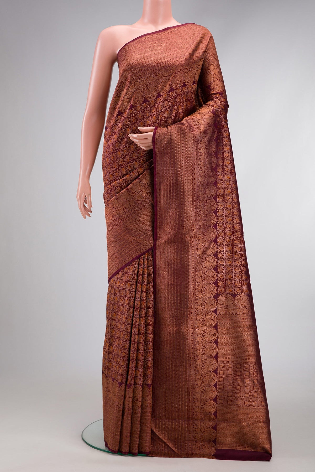 Coffee Brown Dual Tone Kanchipuram Silk Saree with Zari Brocade on the body and Fancy Border.  displayed on a mannequin