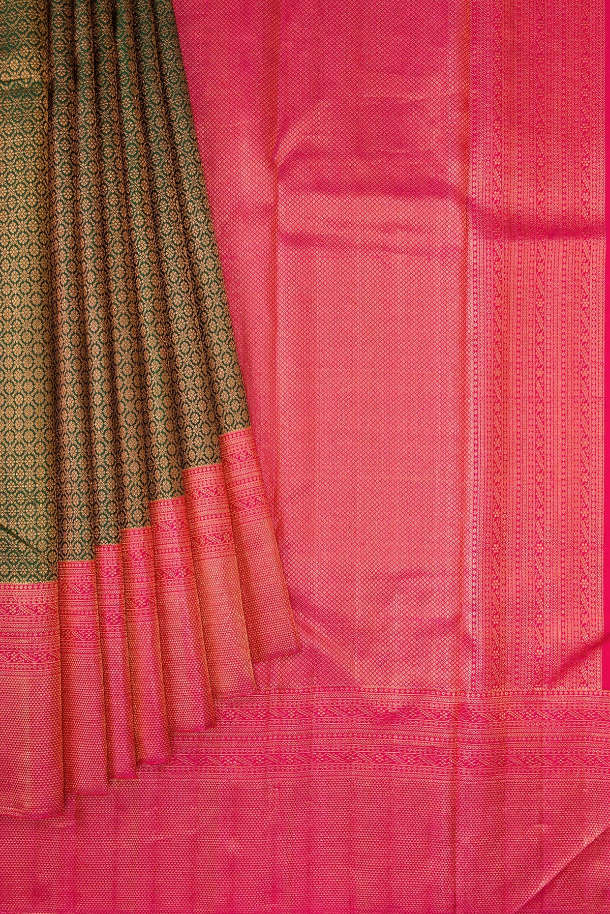 Pleats and pallu of Bottle Green Dual Tone Kanchipuram Silk Saree with Zari Brocade on the body and Fancy Border. 