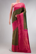 Bottle Green Dual Tone Kanchipuram Silk Saree with Zari Brocade on the body and Zari Border.  displayed on a mannequin
