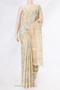 Beige Dual Tone Tussar Silk Saree with Printed design on the body and Zari Border.  displayed on a mannequin