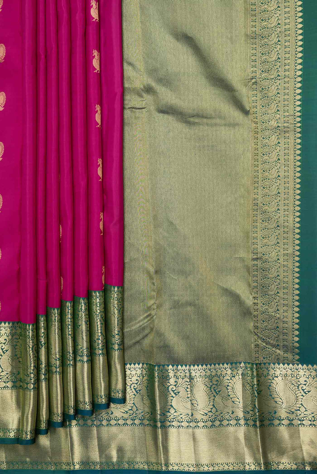 Pleats and pallu of Magenta Dual Tone Kanchipuram Saree with Zari Butta on the body and Zari Border