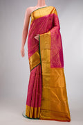 Pure Silk Pure Zari Magenta Dual Tone Kanjivaram Saree with Zari Brocade on the body and Zari Border.  displayed on a mannequin