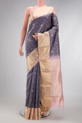 Navy Blue Kanjivaram Silk Saree with Jacquard With Zari Butta on the body and Zari Border.  displayed on a mannequin