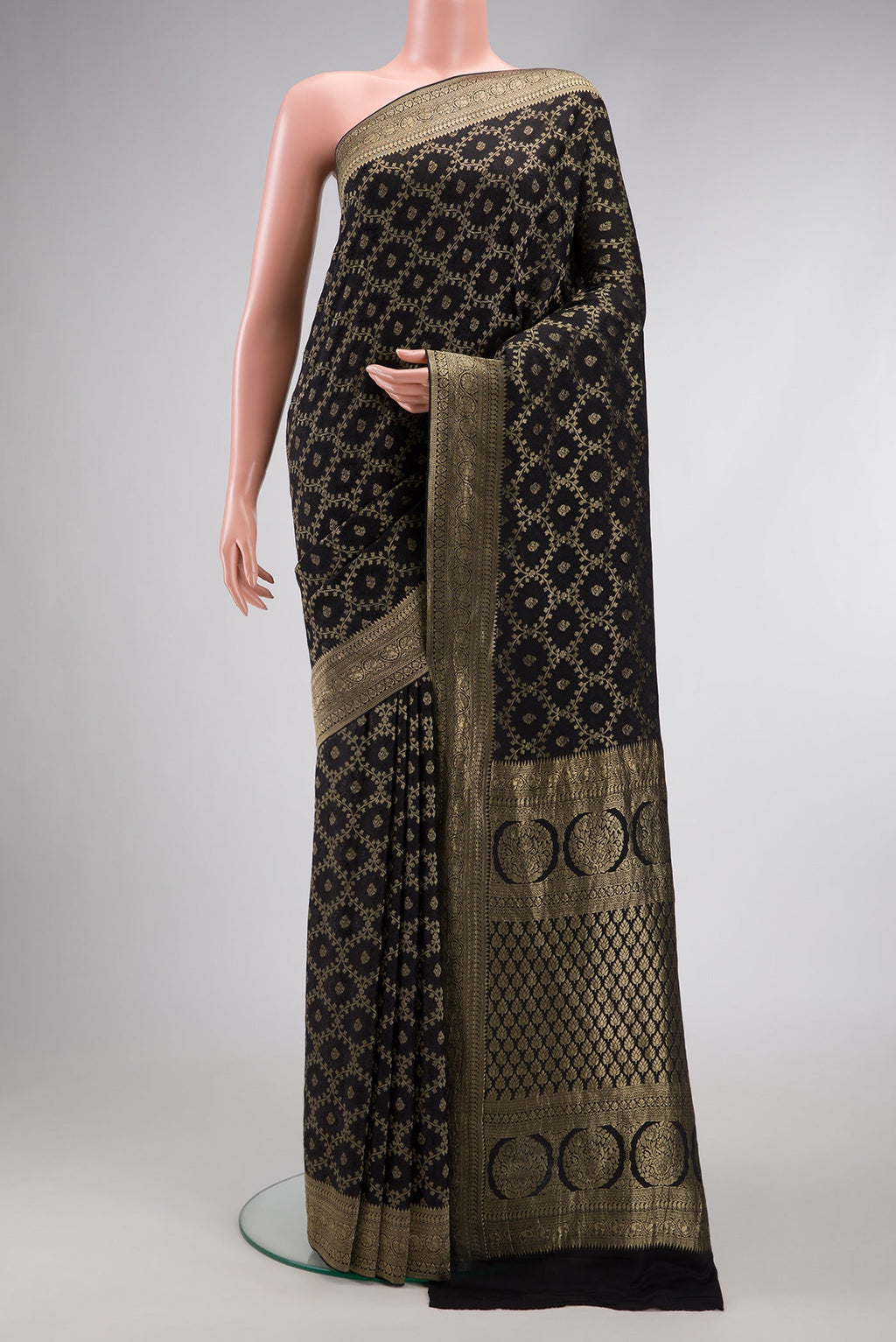 Black Dual Tone Mysore Georgette Saree with Zari Brocade on the body and Zari Border.  displayed on a mannequin