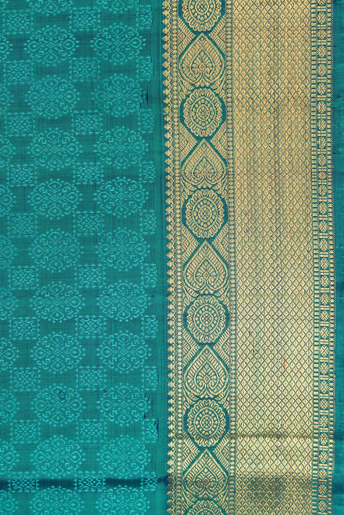 Border image of Peacock Blue Dual Tone Kanjivaram Silk Saree with Jacquard design on the body and Zari Border. 