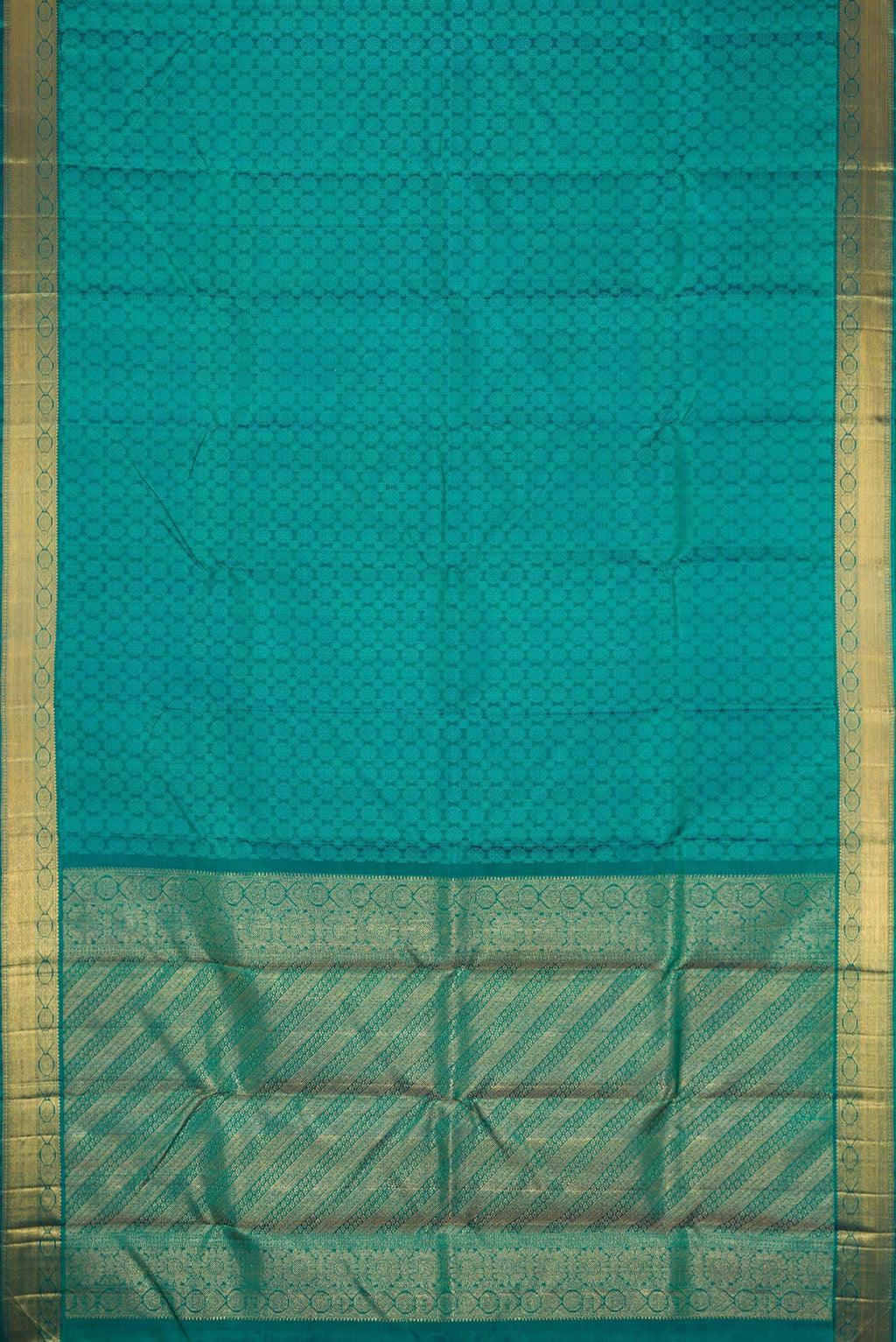 Flat view of Peacock Blue Dual Tone Kanjivaram Silk Saree with Jacquard design on the body and Zari Border. 