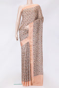 Golden Peach Dual Tone Tussar Silk Saree with Printed design on the body and Zari Border.  displayed on a mannequin