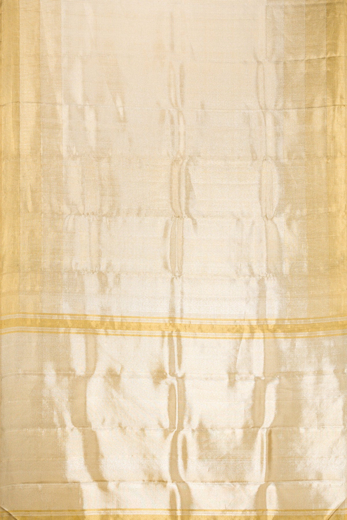 Flat view of Gold Dual Tone Kanjivaram Tissue Silk Saree with Zari Brocade on the body and Zari Border. 