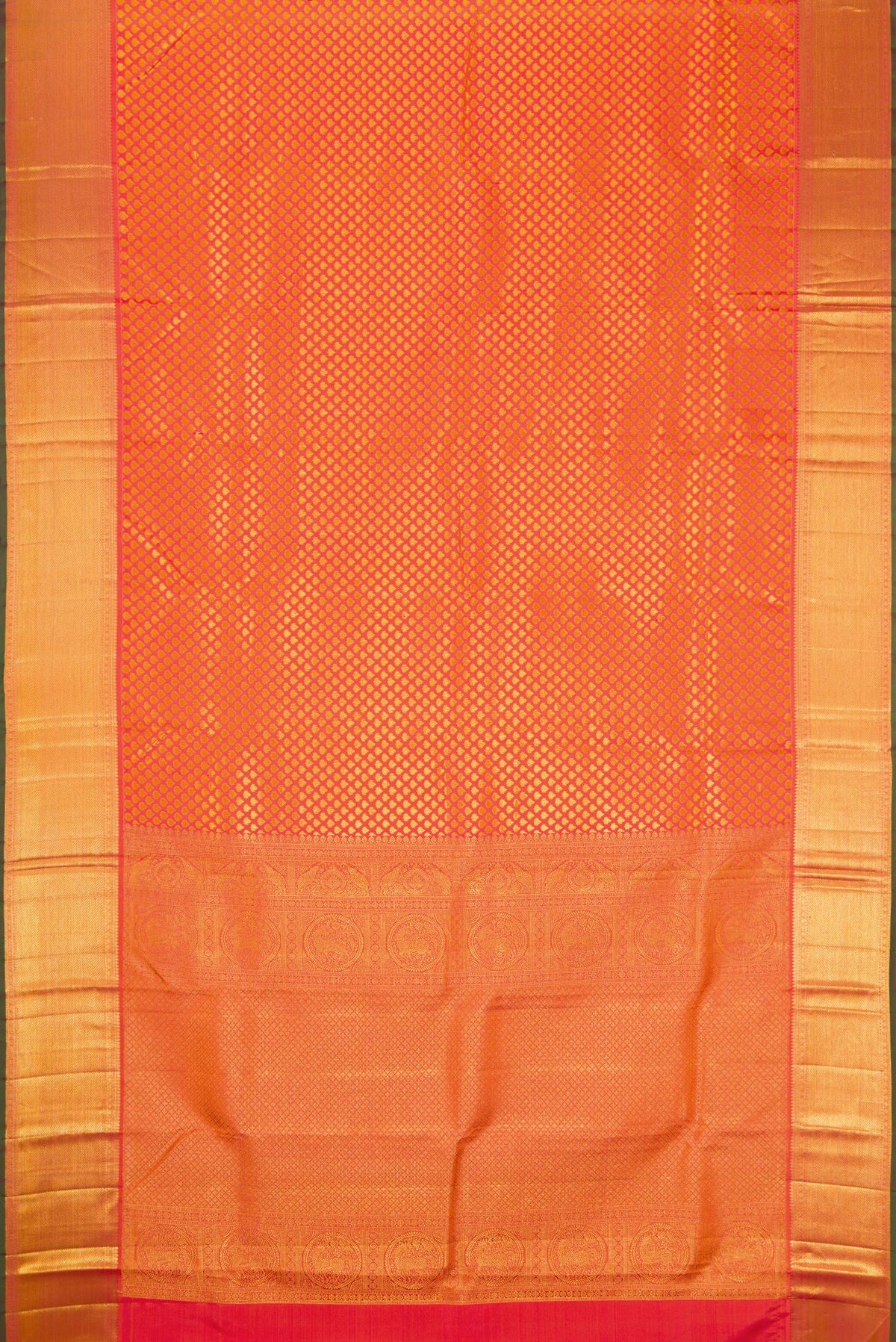 Flat view of Orange Kanjivaram Silk Saree with Zari Brocade on the body and Zari Border. 