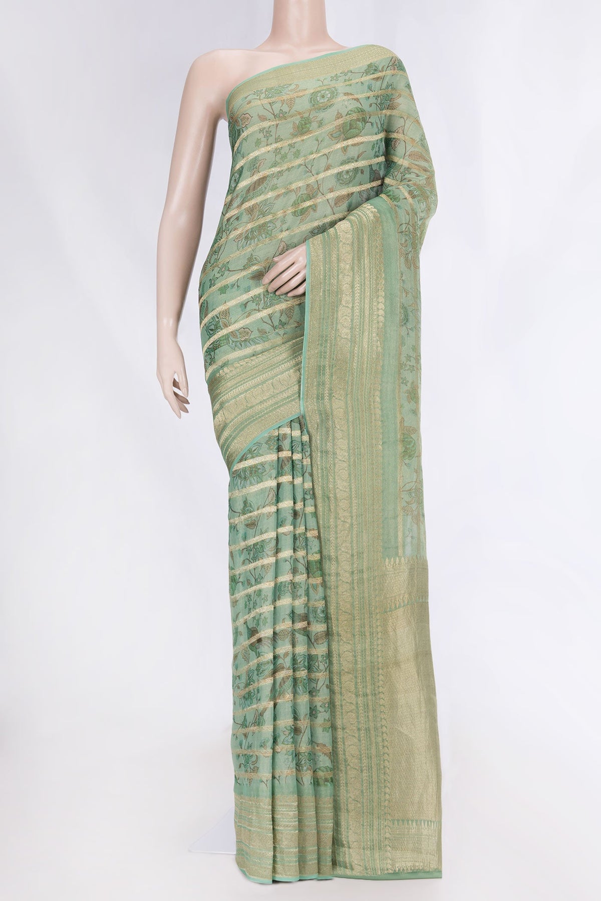 Green Dual Tone Mysore Georgette Saree with Printed design on the body and Zari Border displayed on a mannequin