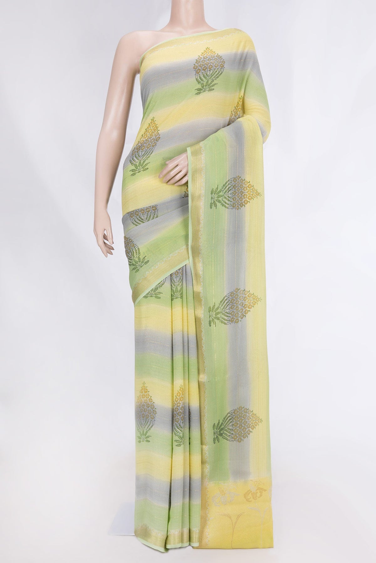 Green, Yellow and Lavender Color Mysore Georgette Saree with Checked design on the body and Zari Border displayed on a mannequin