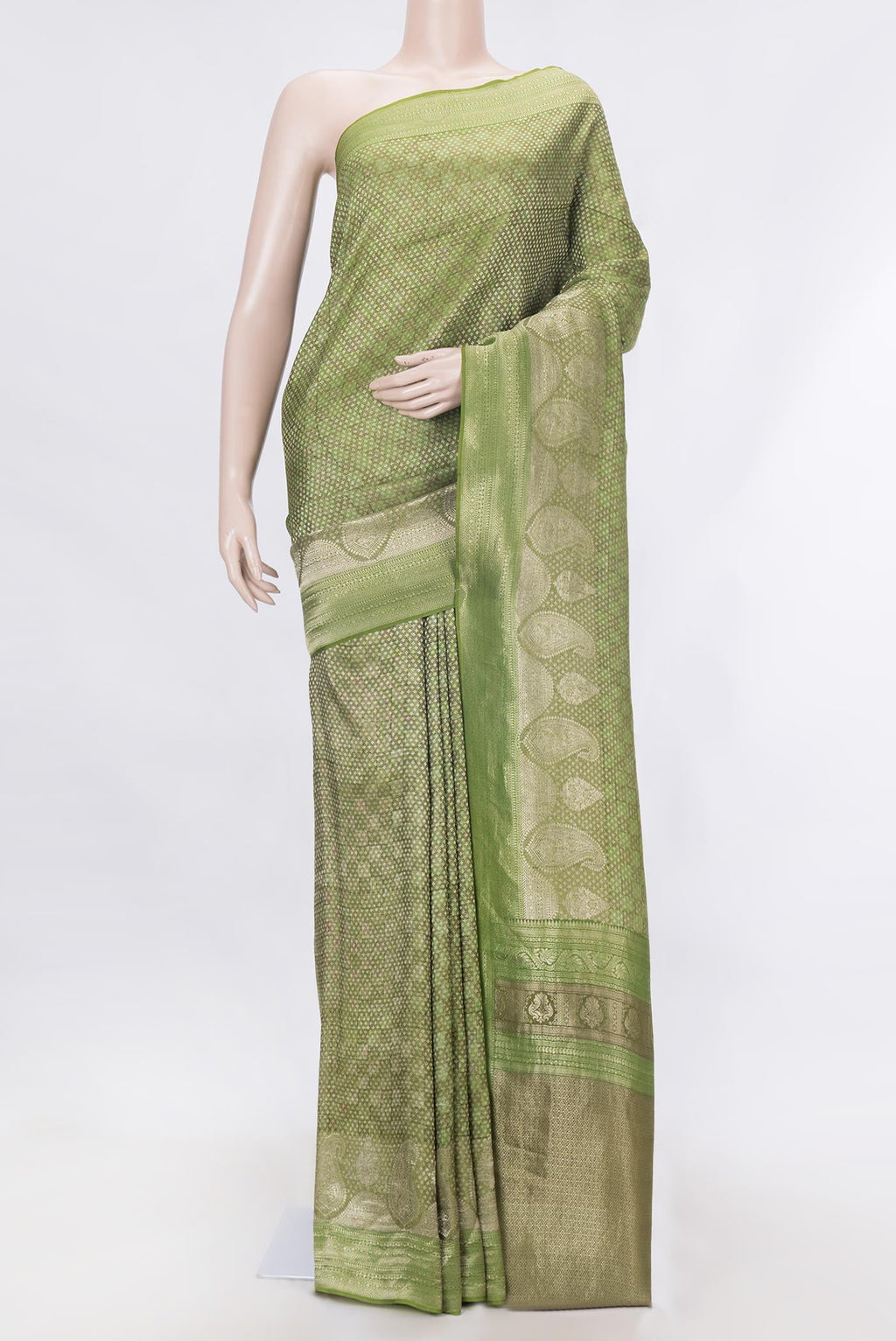Green Dual Tone Mysore Georgette Saree With Printed design on the body and Zari Border displayed on a mannequin