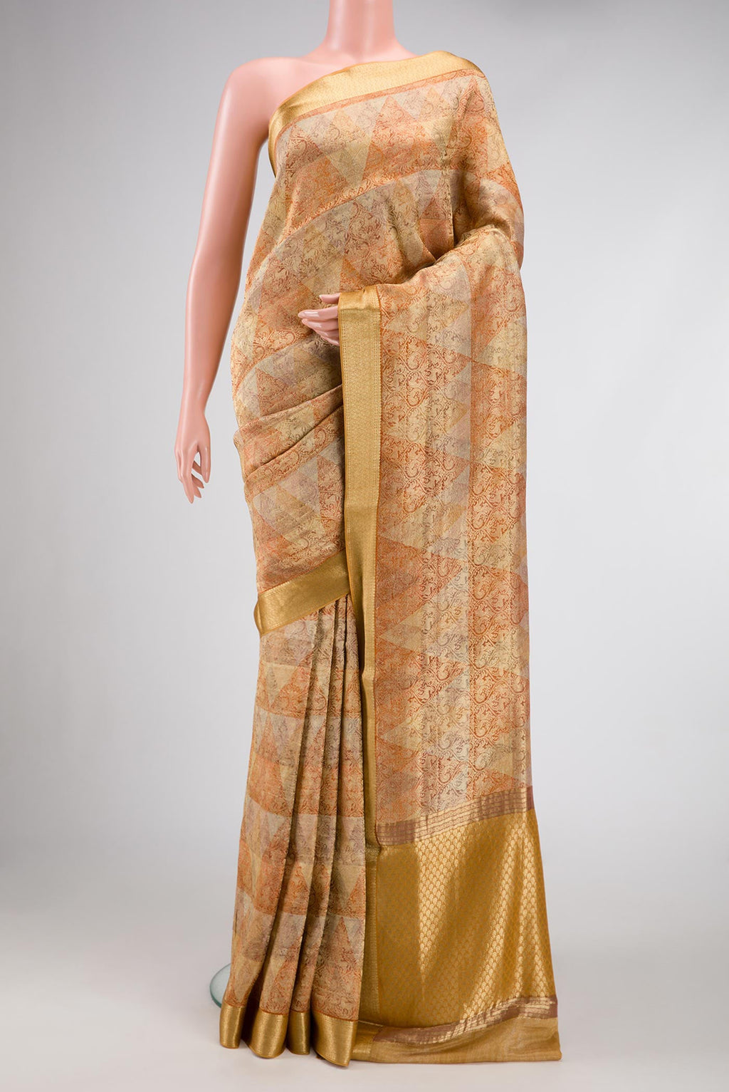 Gold Dual Tone Mysore Georgette Saree with Zari Brocade on the body and Zari Border.  displayed on a mannequin
