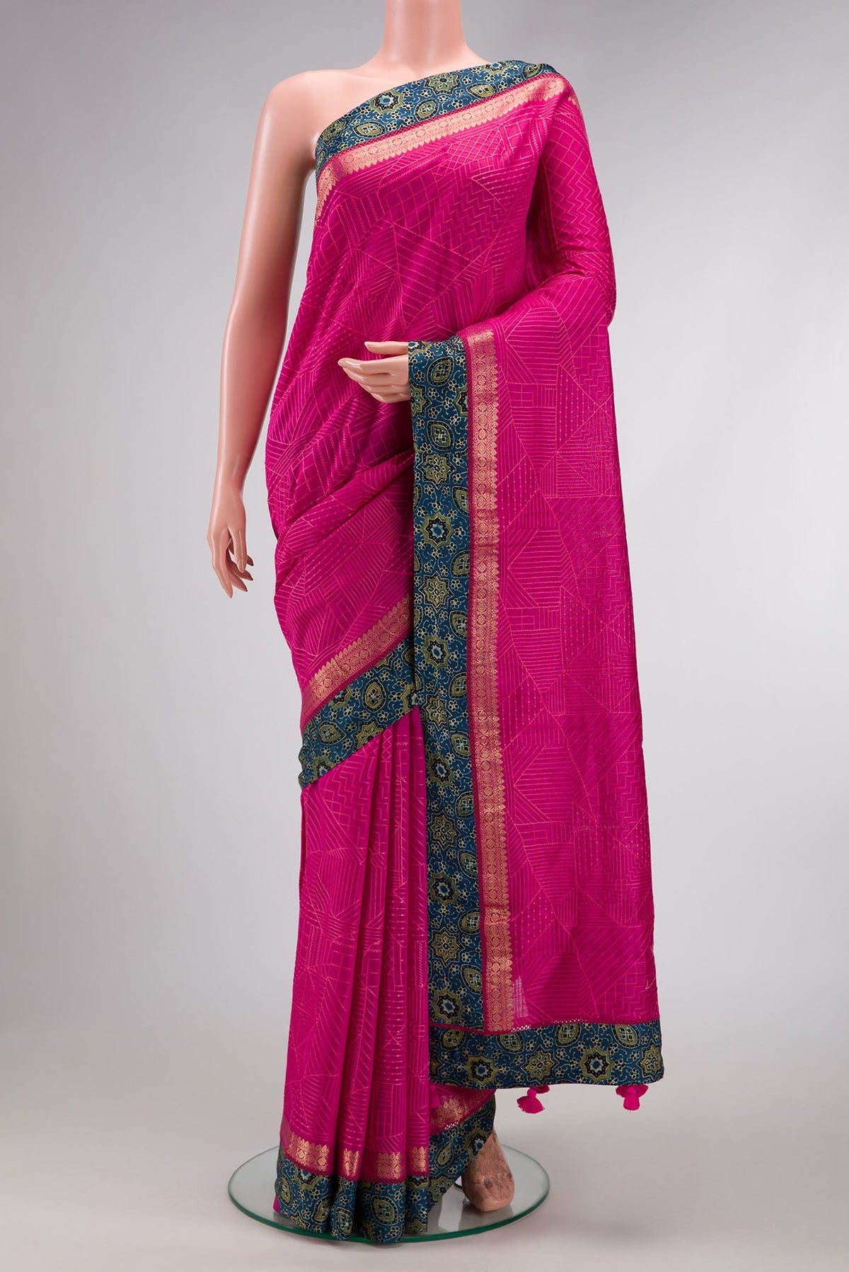 Pink Dual Tone Tussar Silk Saree with Embroidery on the body and Fancy Border.  displayed on a mannequin