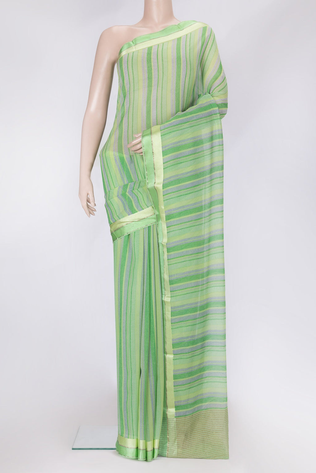 Parrot Green Dual Tone Mysore Chiffon Saree with Printed design on the body and Zari Border.  displayed on a mannequin