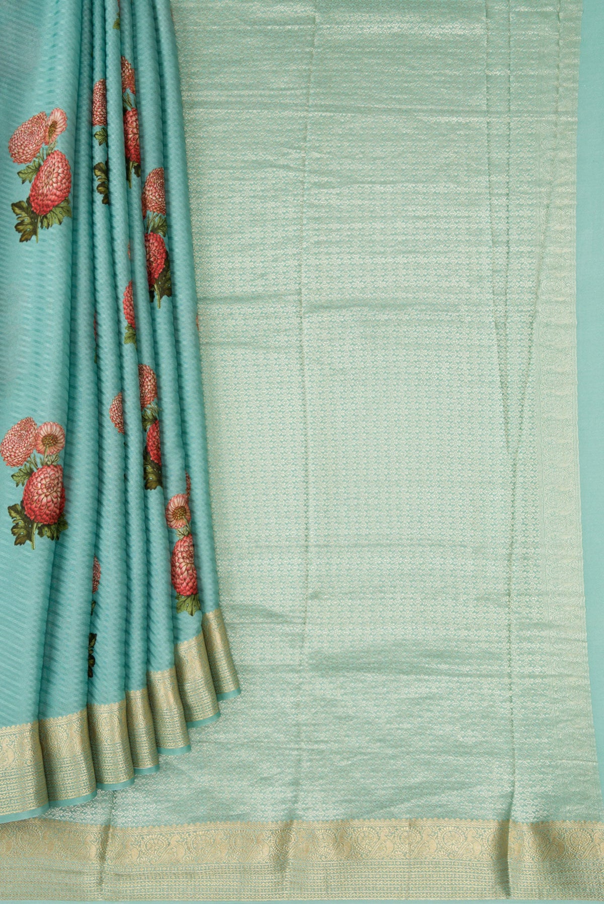 Pleats and pallu of Light Blue Dual Tone Tussar Silk Saree with Printed design on the body and Zari Border. 