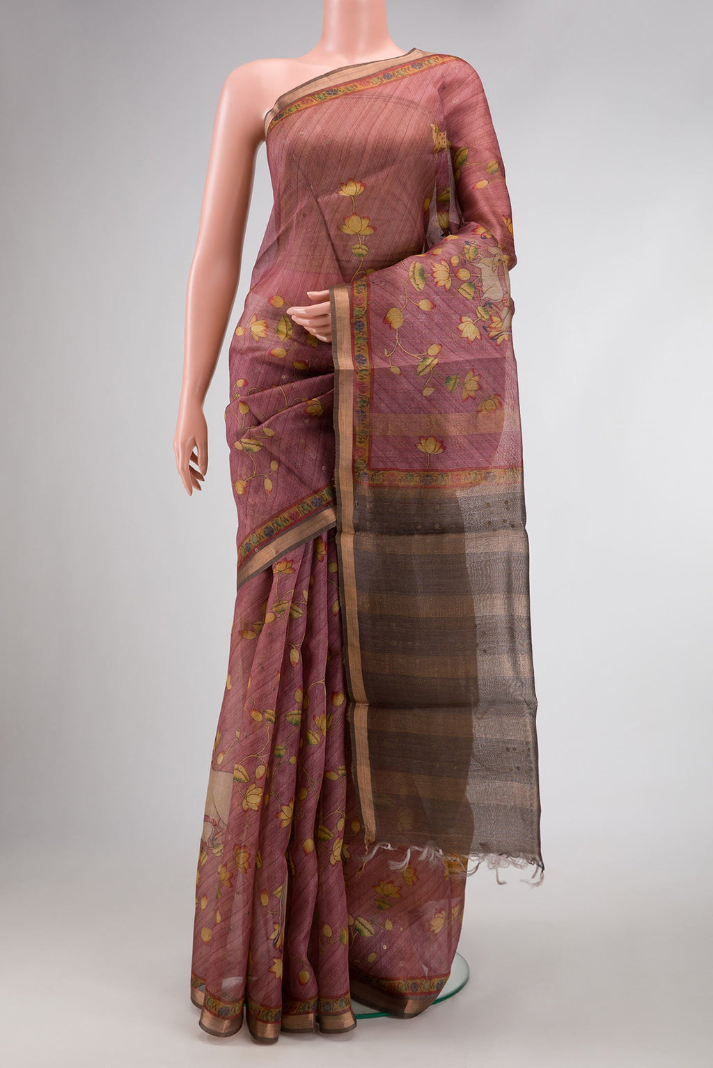 Pink Dual Tone Tussar Silk Saree with Printed design on the body and Zari Border.  displayed on a mannequin