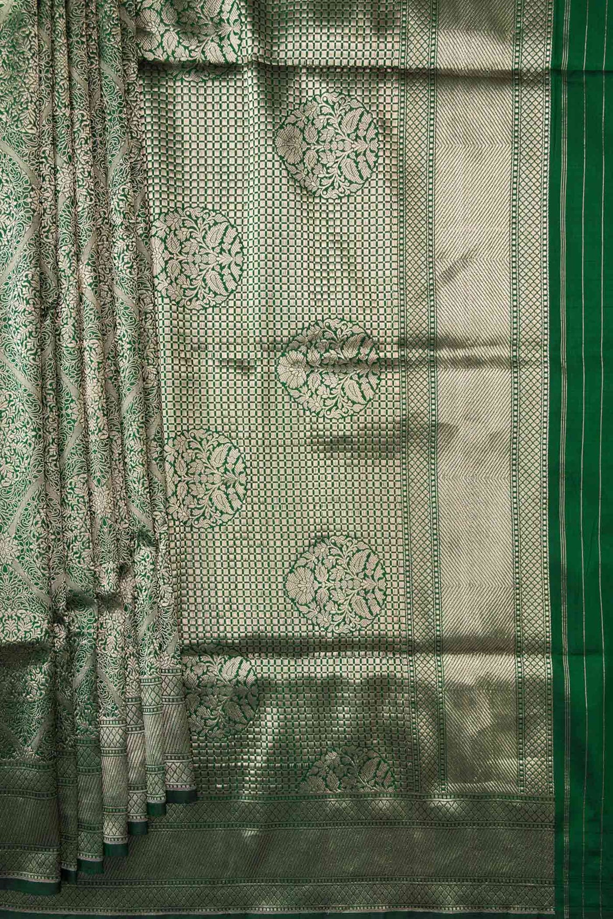 Pleats and pallu of Bottle Green Dual Tone Banarasi Silk Saree with Zari Brocade on the body and Zari Border. 
