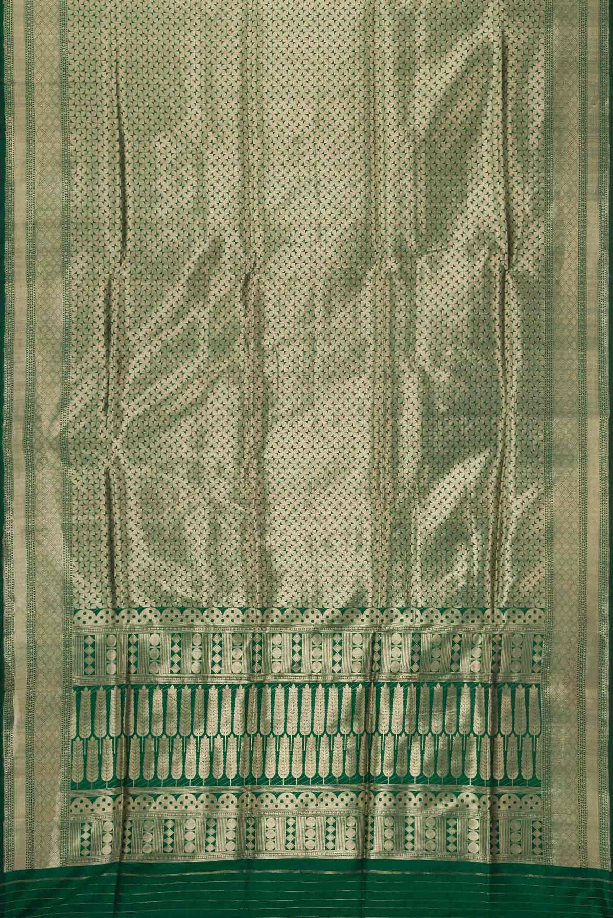 Flat view of Bottle Green Dual Tone Banarasi Silk Saree with Zari Brocade on the body and Zari Border. 