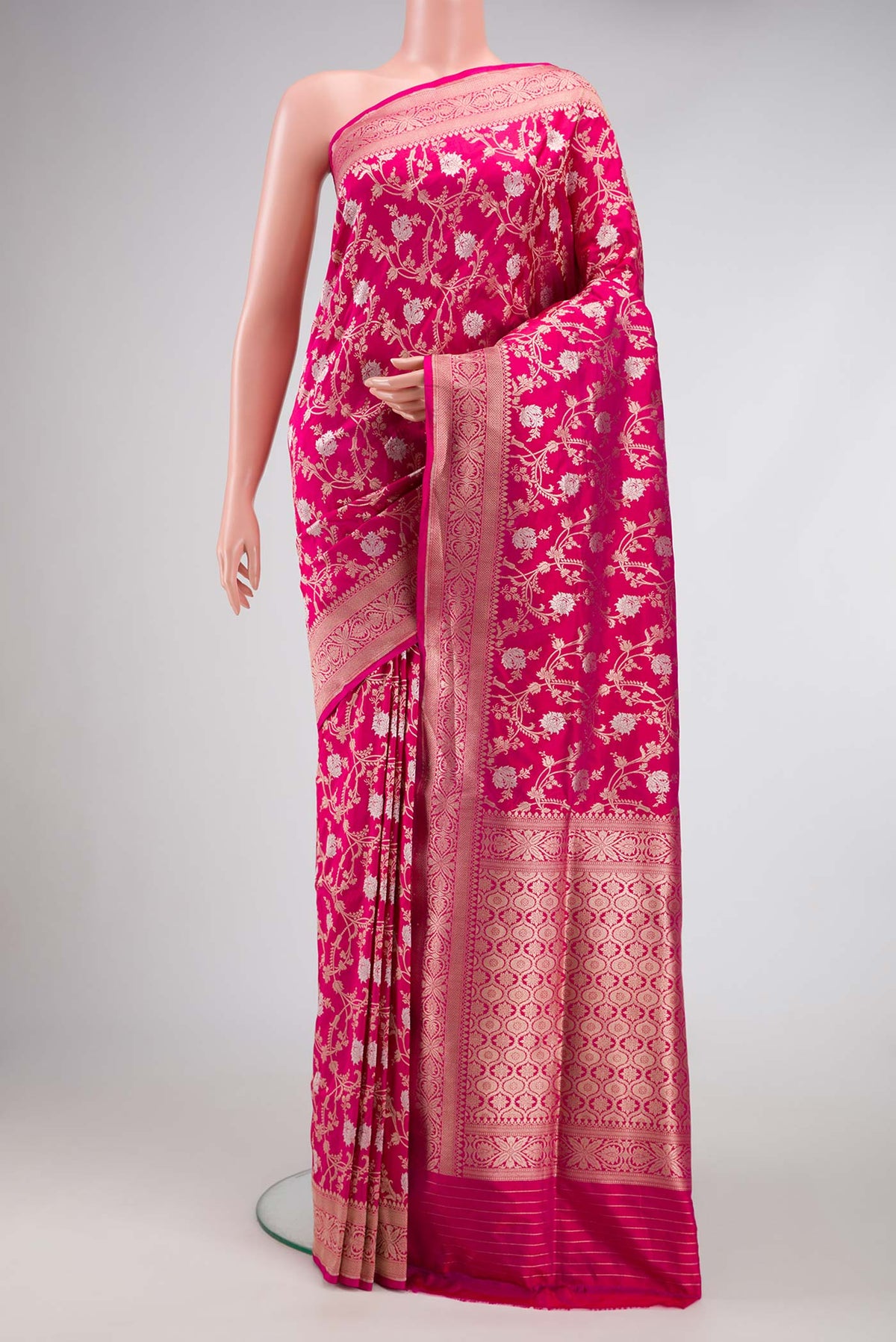 Pink Dual Tone Banarasi Silk Saree with Zari Brocade on the body and Zari Border.  displayed on a mannequin