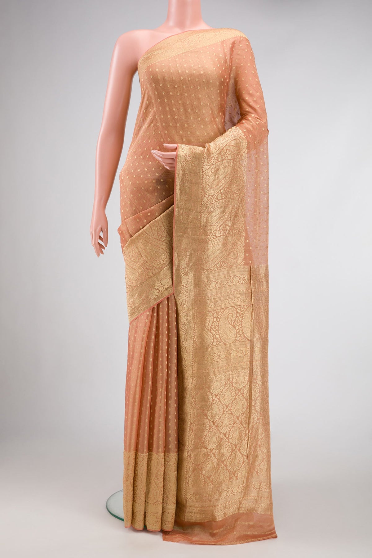 Golden Peach Dual Tone Banarasi Georgette Saree with Zari Butta on the body and Zari Border.  displayed on a mannequin