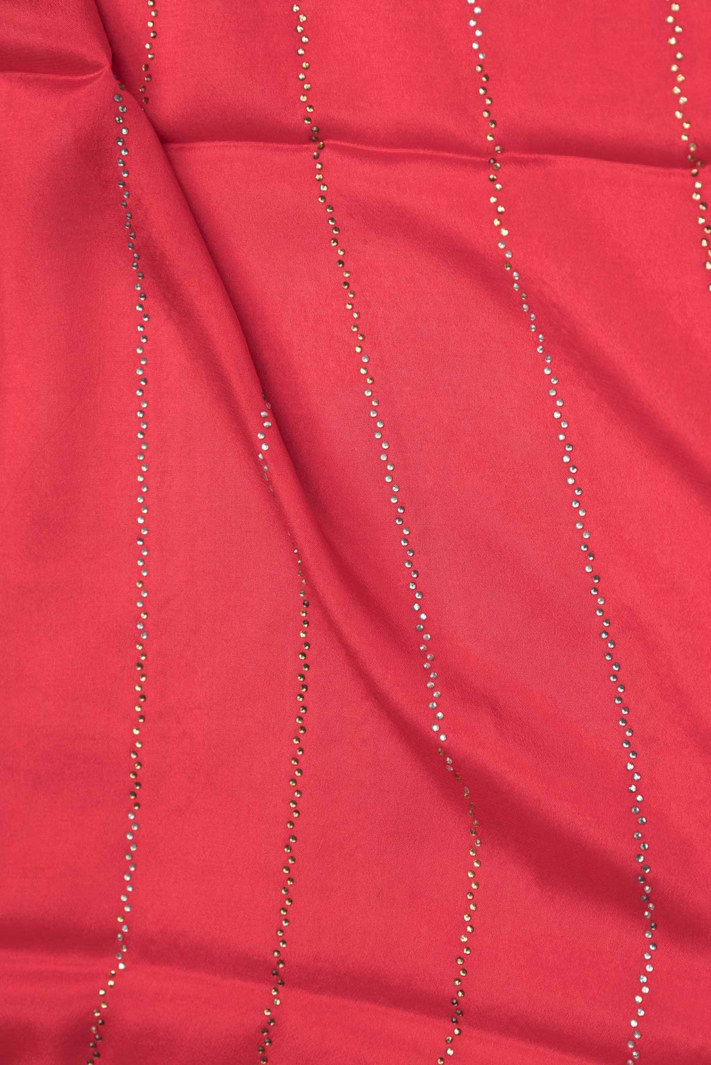 Close up of Red Dual Tone Mysore Crepe Saree with Embroidery on the body and Zari Border displaying folds