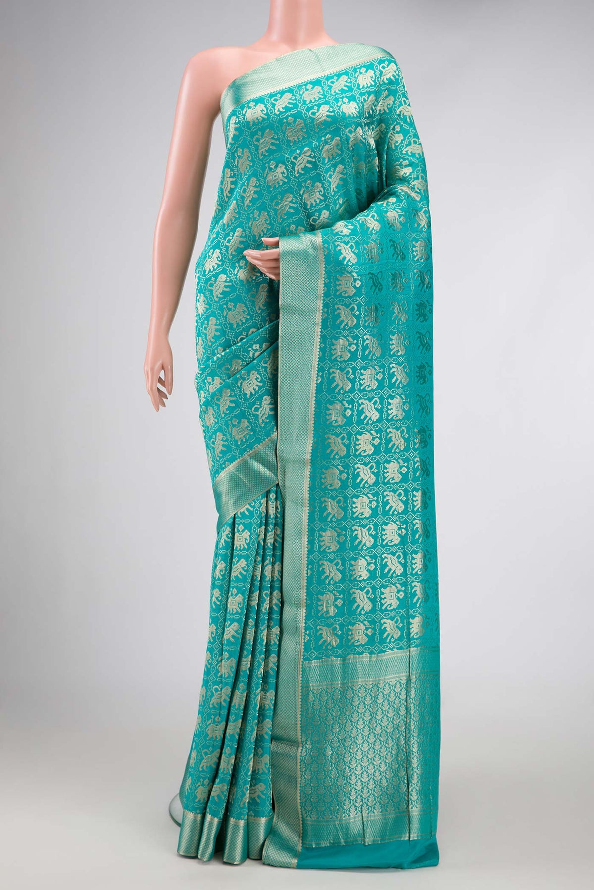 Sky Blue Dual Tone Banarasi Georgette Saree with Zari Brocade on the body and Zari Border.  displayed on a mannequin