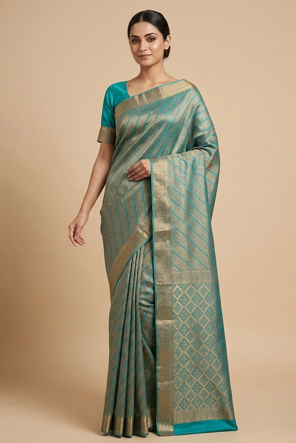 Model wearing a Sky Blue Mysore Crepe Saree with Zari Brocade on the body and Zari Border.