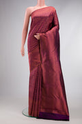 Purple Dual Tone Kanchipuram Silk Saree with Zari Brocade on the body and Fancy Border.  displayed on a mannequin